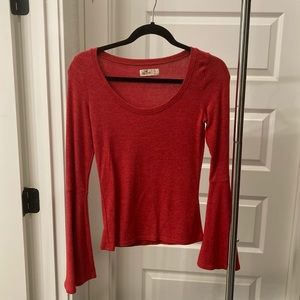 red orange bell sleeved top